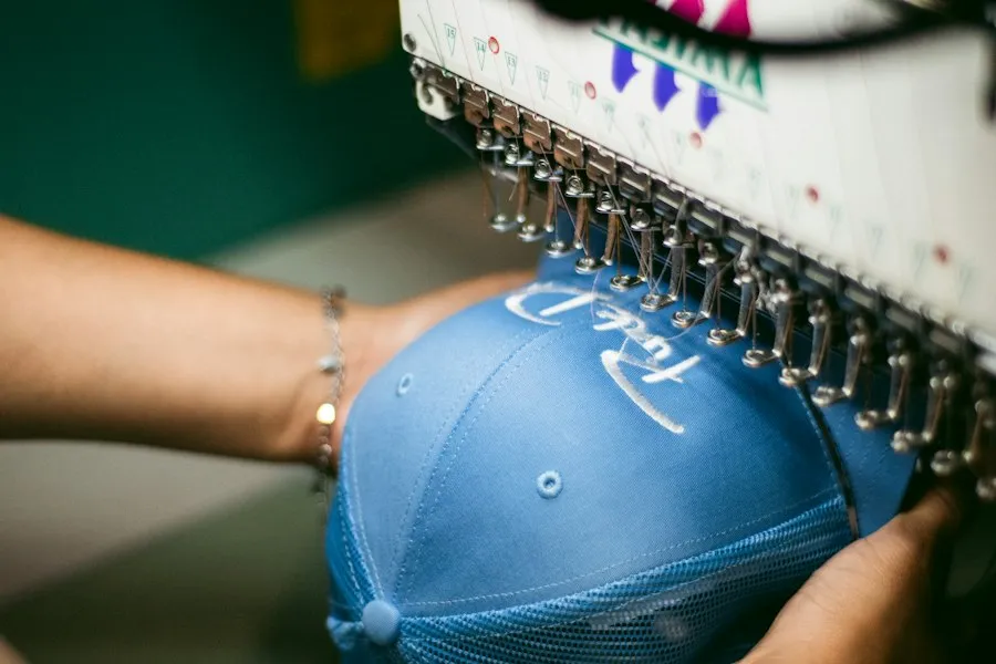 A cap being embroidered