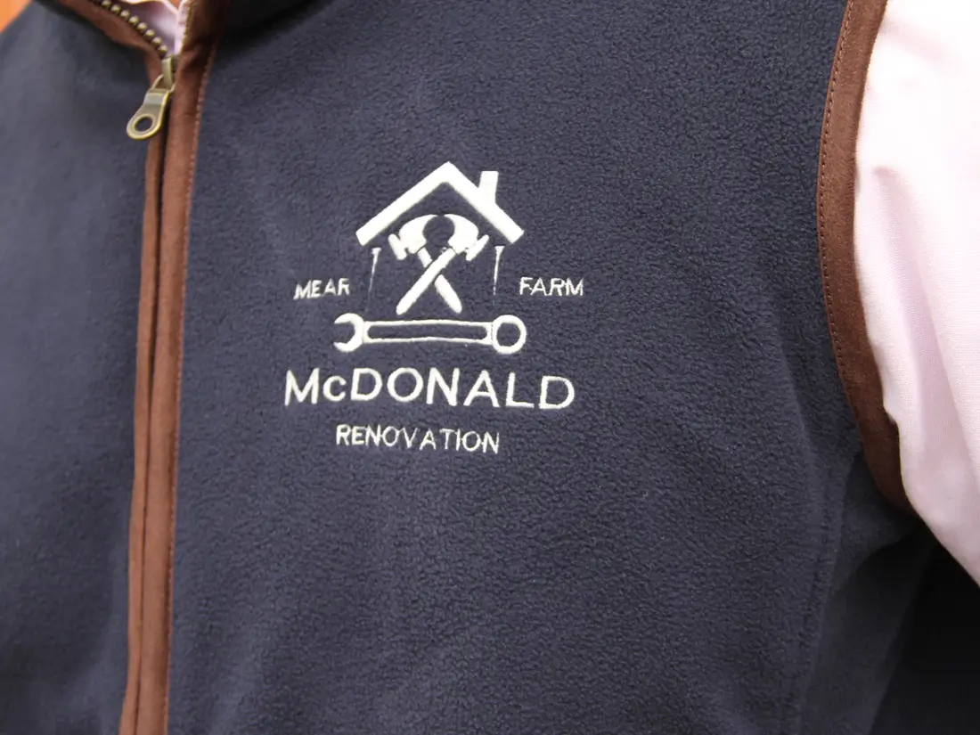 McDonald Renovation, Fleece gilets · Embroidery