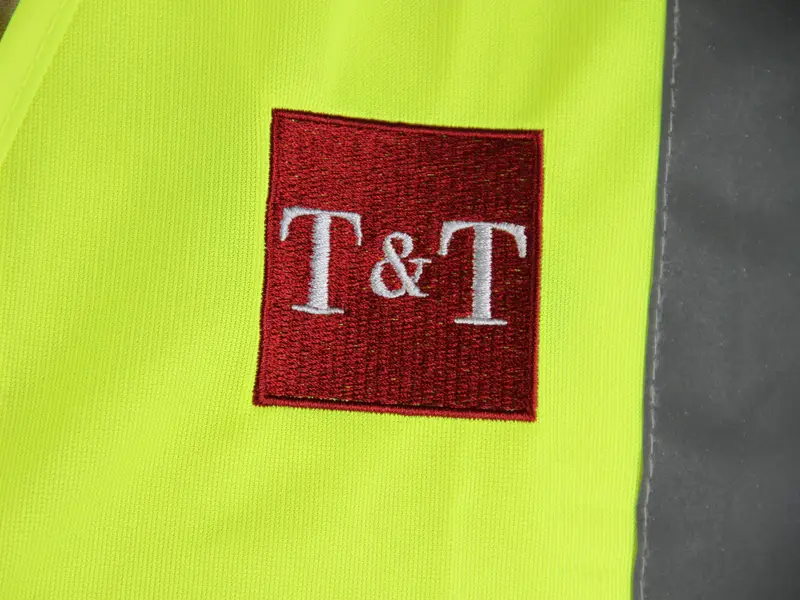 Thomas & Thomas, Hi-vis vests · Embroidery